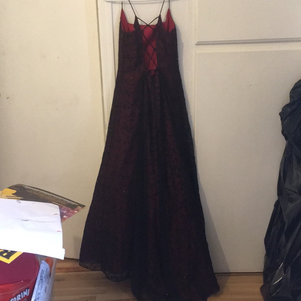 Lace up corseted beaded gown. Prom